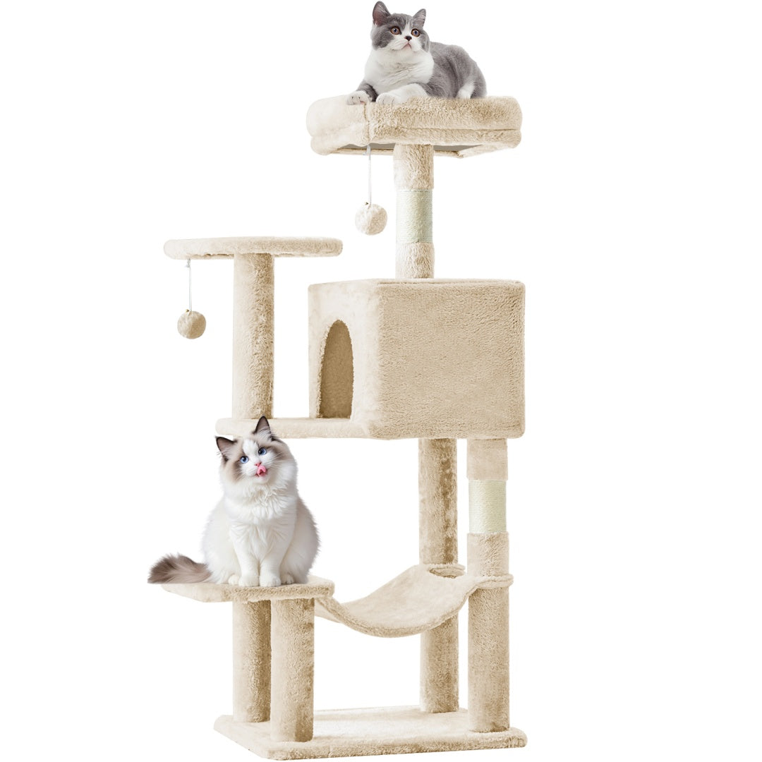 Arbre à chat beige avec niche, hamac et plateformes, utilisé par deux chats